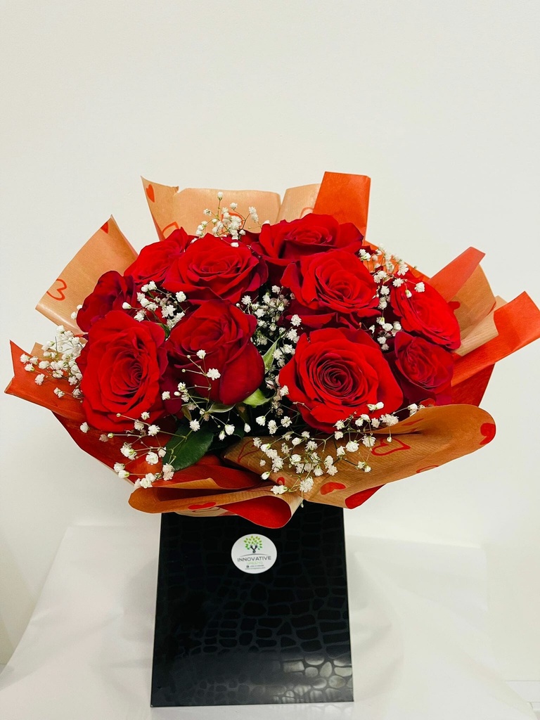 12 Roses bouquet in an elegant carton bag